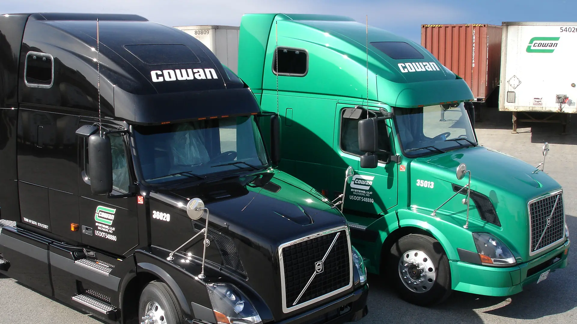 photos of various trucks and drivers smiling inside truck cab