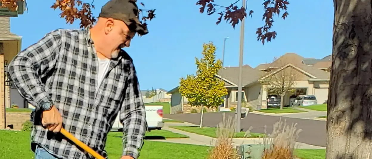 Man raking leaves