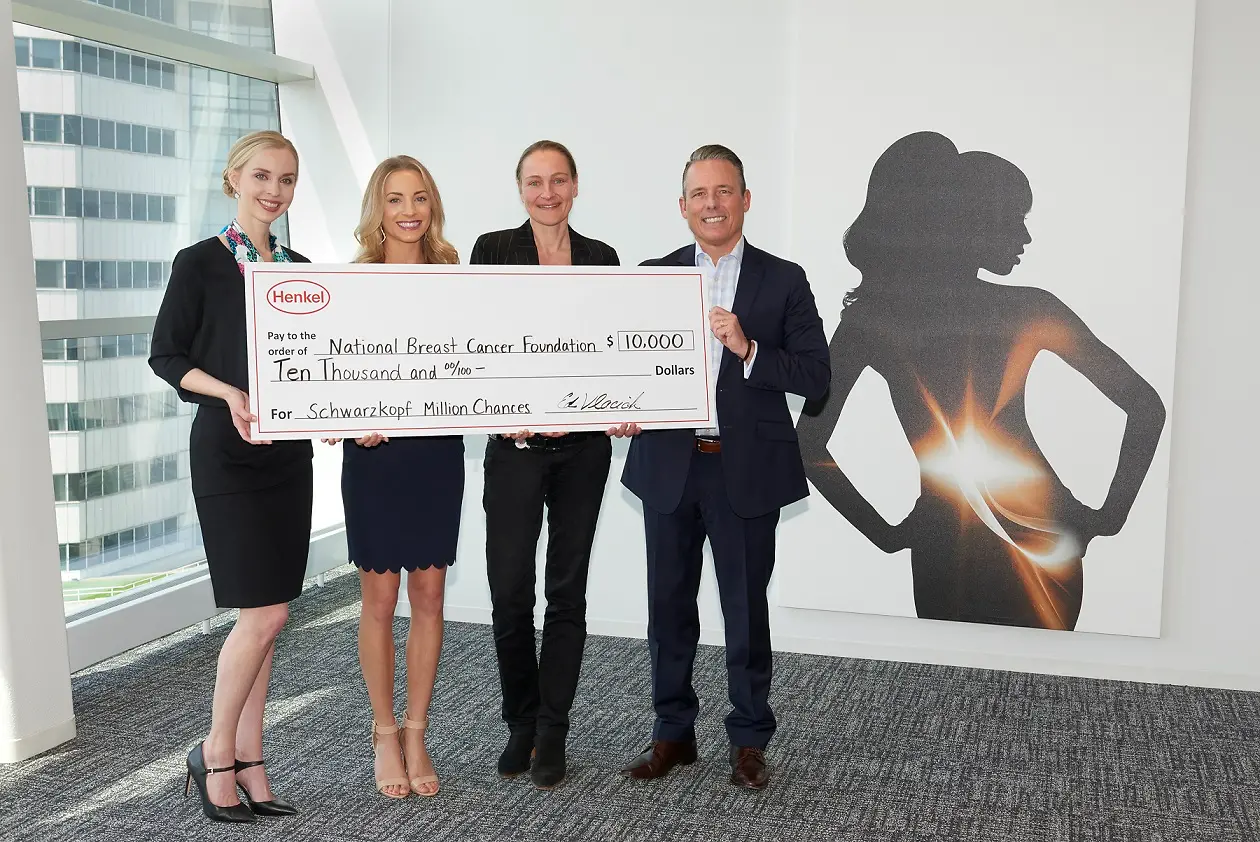 Danae Johnson, Senior Director of Development, and Kara Causey, Corporate Partner Manager for National Breast Cancer Foundation, accept a donation from Xenia Barth, Henkel's North America Vice President of Marketing, Hair; and Ed Vlacich, North America Region Head, Henkel Beauty Care, to kick off the partnership between the organizations as part of the company's Schwarzkopf Million Chances initiative.